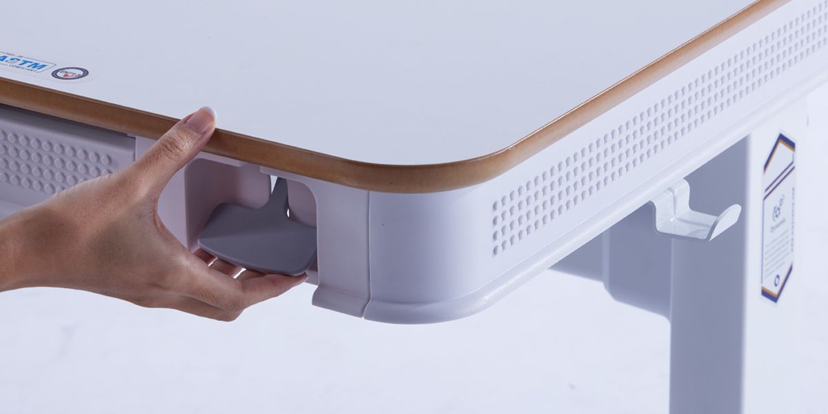 Easy-to-reach sit and stand switch for ergonomic design